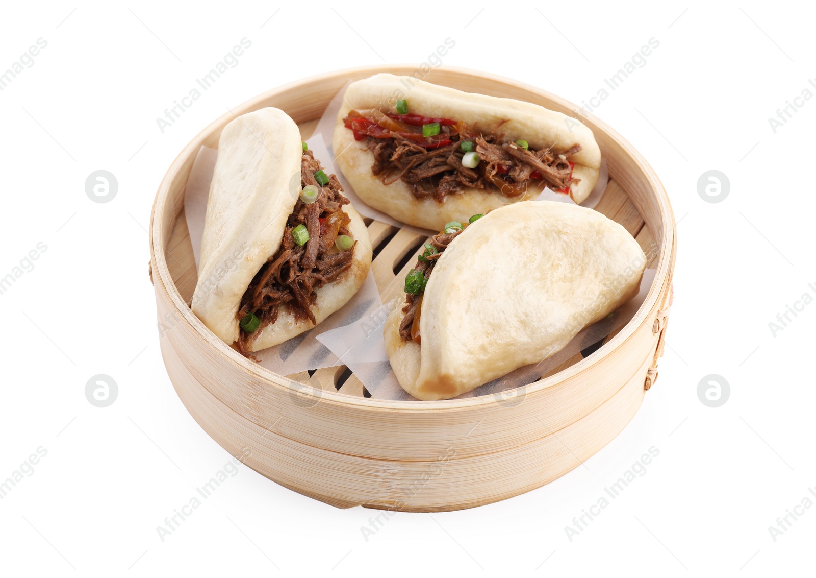 Photo of Delicious gua bao in bamboo steamer isolated on white