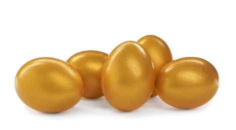 Many shiny golden eggs on white background