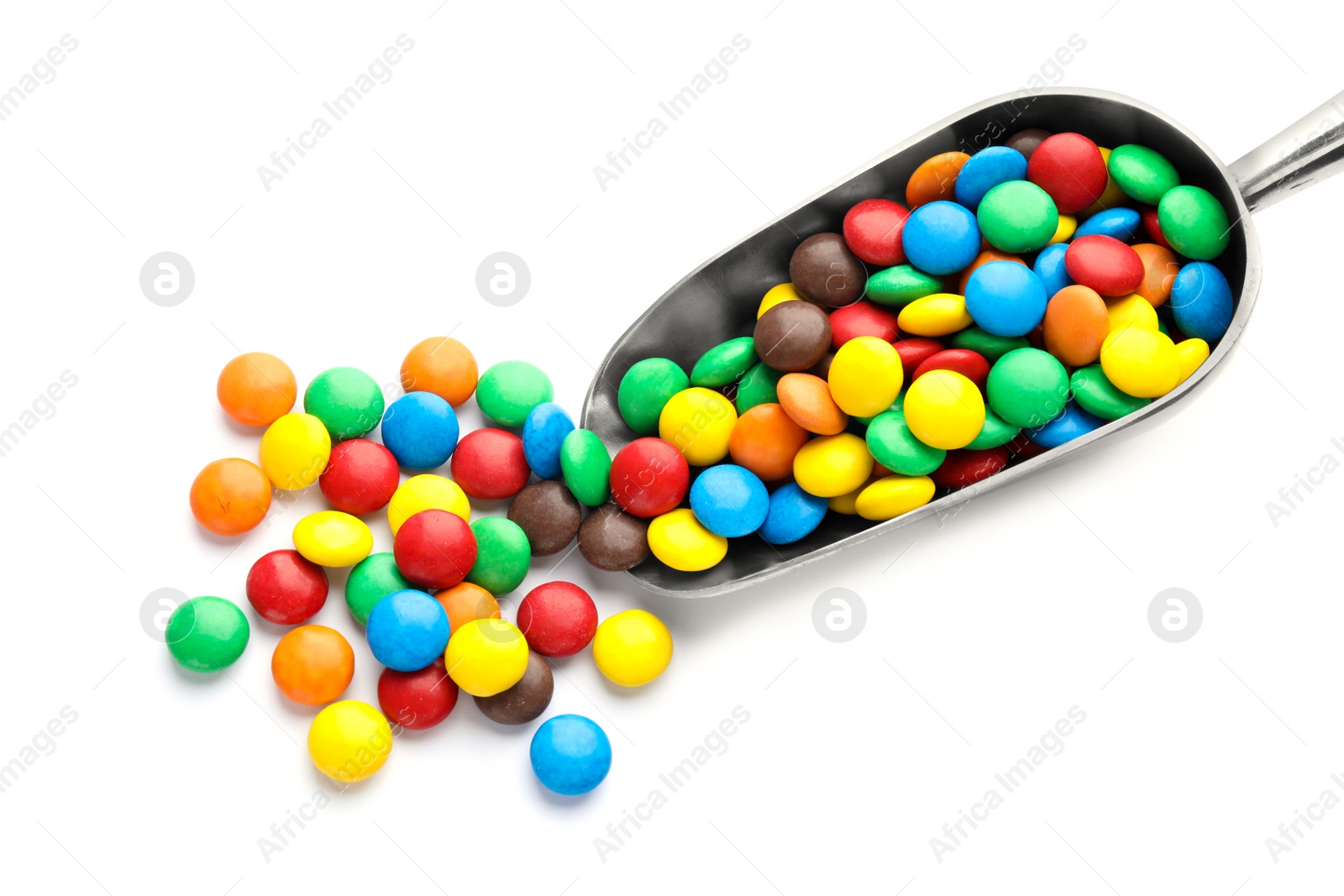 Photo of Scoop with colorful candies on white background