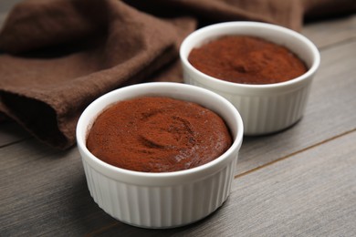 Photo of Delicious fresh chocolate fondant on wooden table