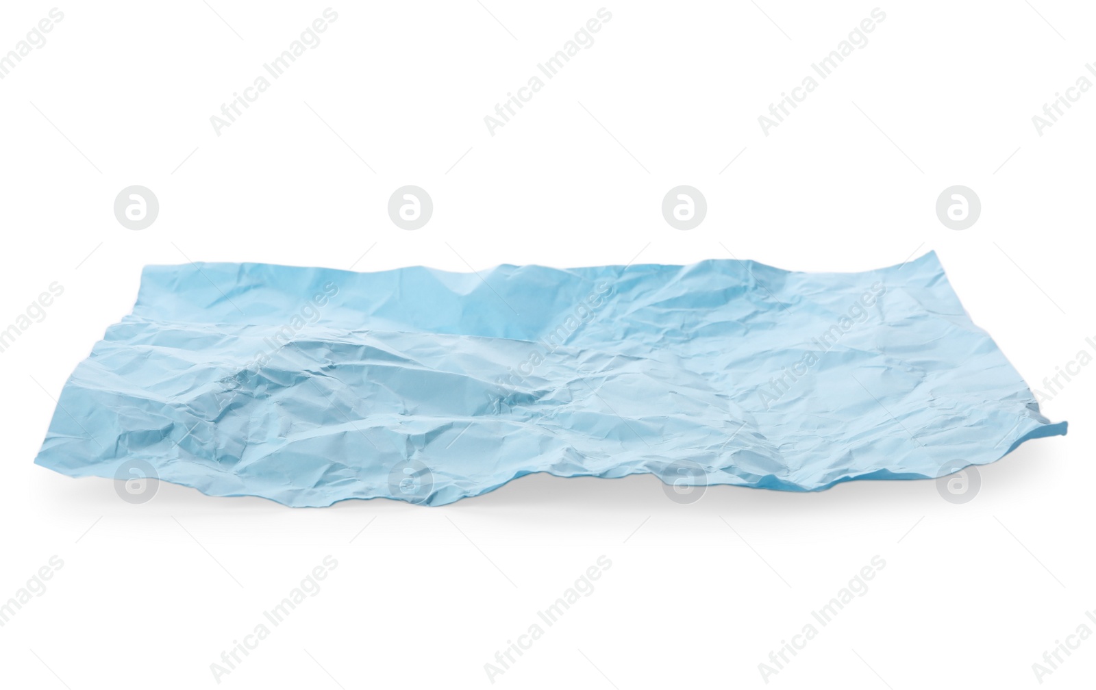 Photo of Color sheet of crumpled paper on white background