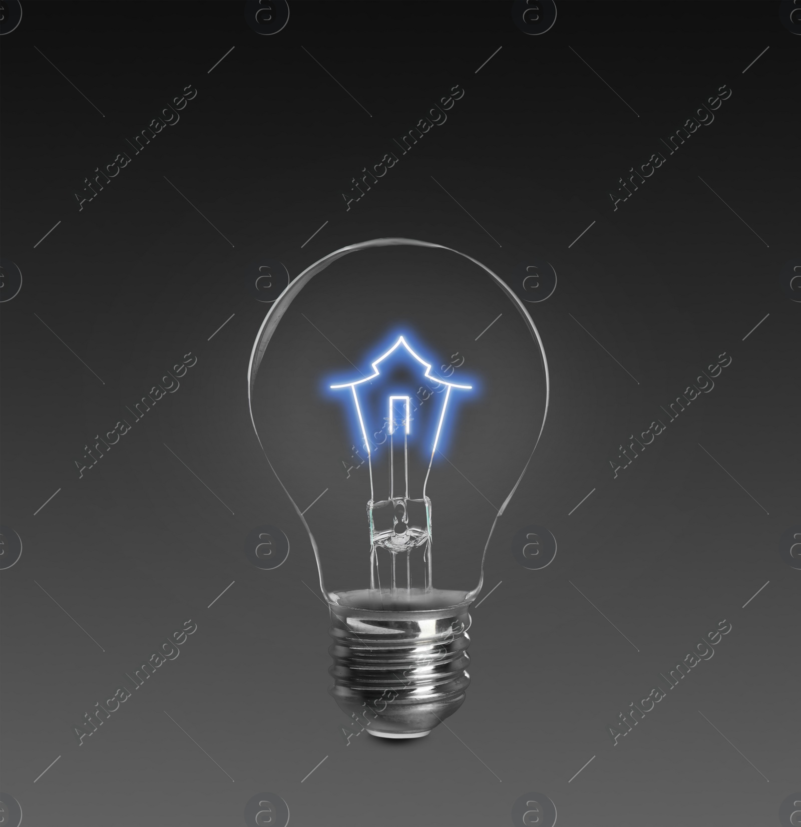 Image of Light bulb with tungsten filament in shape on house on dark background. Energy efficiency, loan, property or business idea concepts
