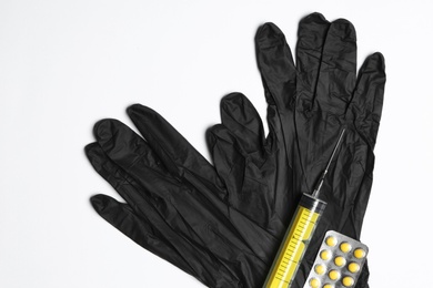 Photo of Flat lay composition with medical gloves on white background