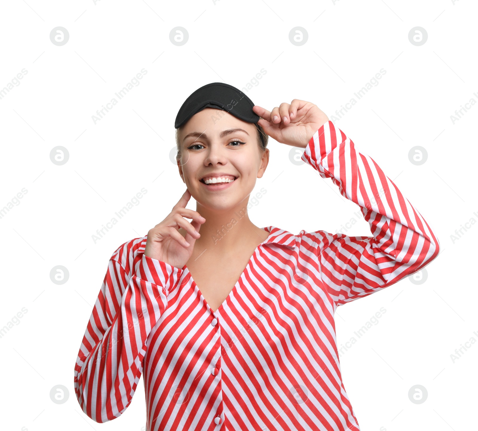 Photo of Beautiful woman wearing pajamas and sleeping mask on white background. Bedtime