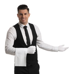 Photo of Handsome butler with towel on white background