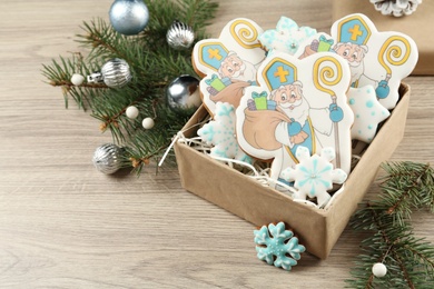 Delicious gingerbread cookies on wooden table. St. Nicholas Day celebration