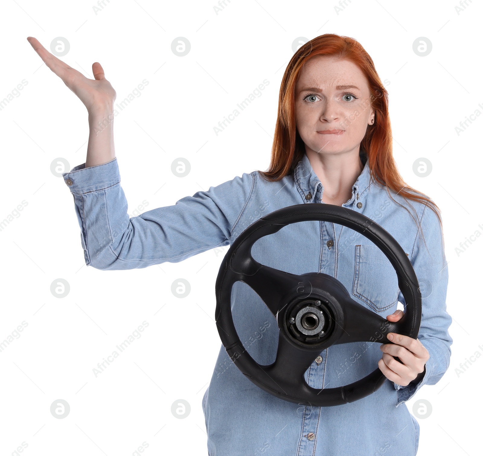 Photo of Emotional young woman with steering wheel on white background