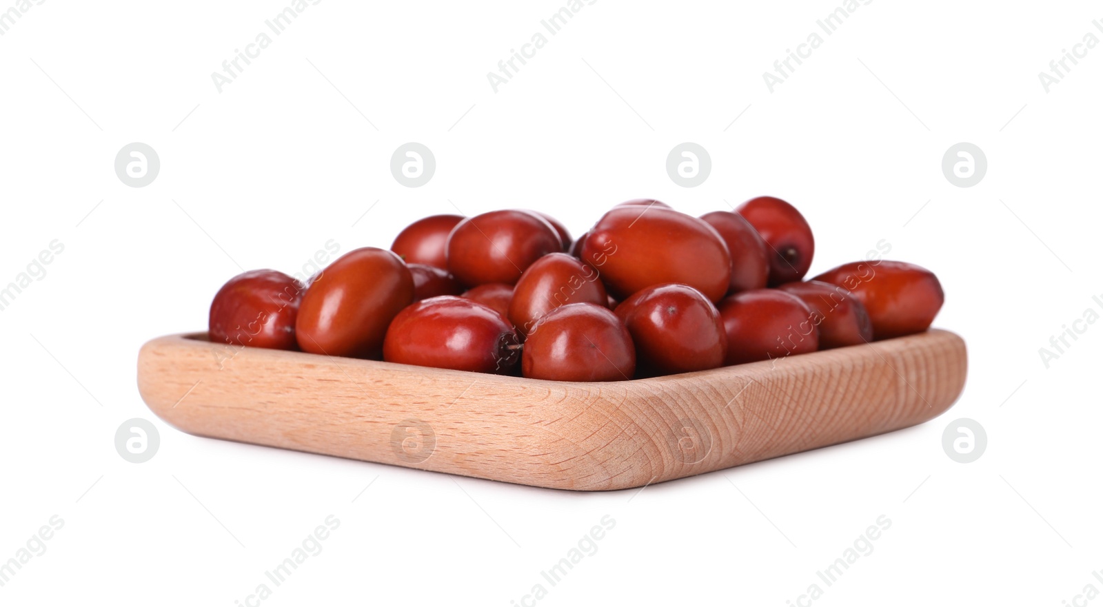 Photo of Wooden plate of ripe red dates on white background