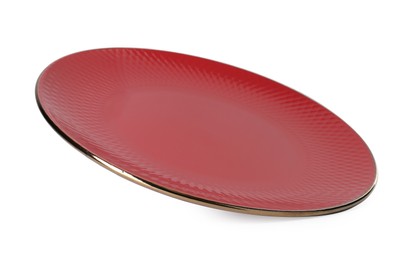 Photo of One beautiful red plate isolated on white