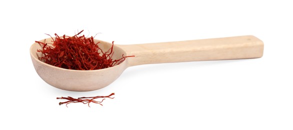 Photo of Wooden spoon of dried red saffron isolated on white