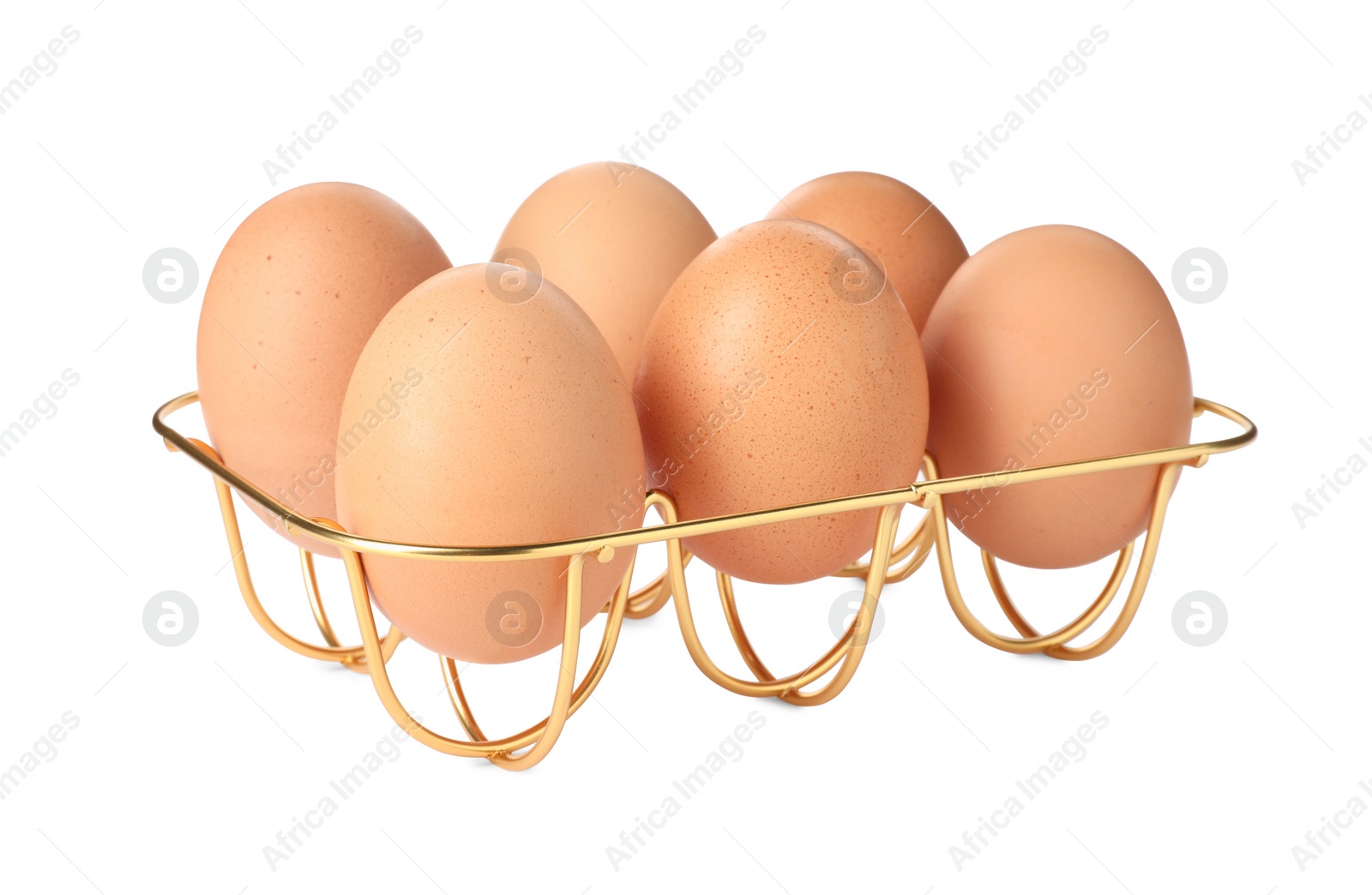 Photo of Golden metal egg tray on white background