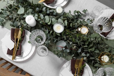 Photo of Luxury table setting with beautiful decor and blank cards. Festive dinner