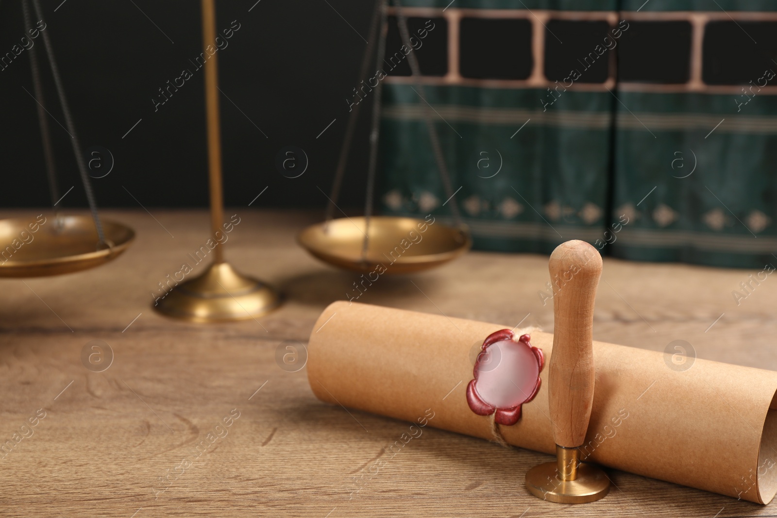 Photo of Notary's public pen and sealed document on wooden table