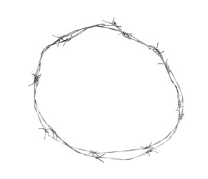 Photo of Shiny metal barbed wire isolated on white