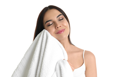 Photo of Young woman wiping face with towel on white background