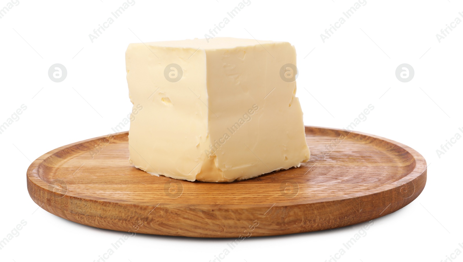 Photo of Block of tasty butter with wooden tray isolated on white