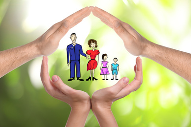 People forming house with their hands and illustration of family on blurred green background, closeup