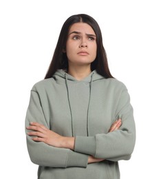 Photo of Sadness. Unhappy woman with crossed arms on white background