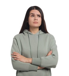 Sadness. Unhappy woman with crossed arms on white background