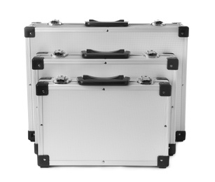 Photo of Set of aluminum hard cases on white background