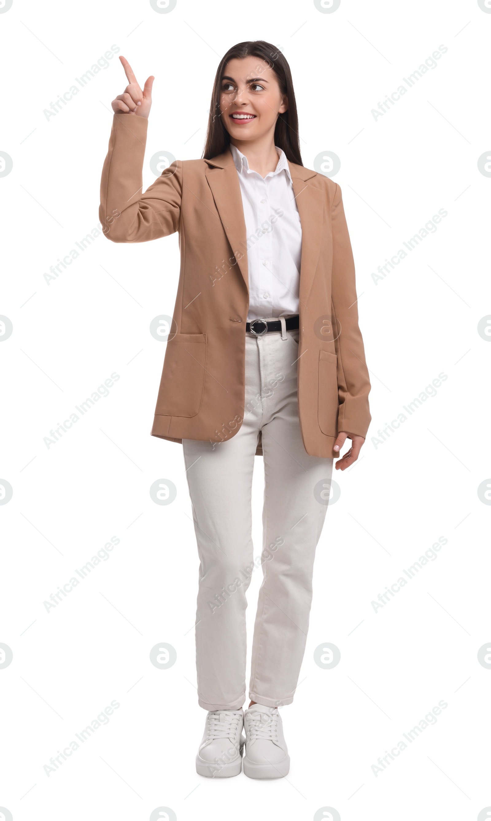 Photo of Beautiful businesswoman in suit pointing at something on white background