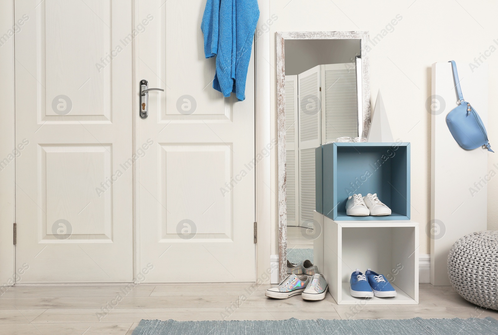 Photo of Cozy hallway interior with new stylish furniture