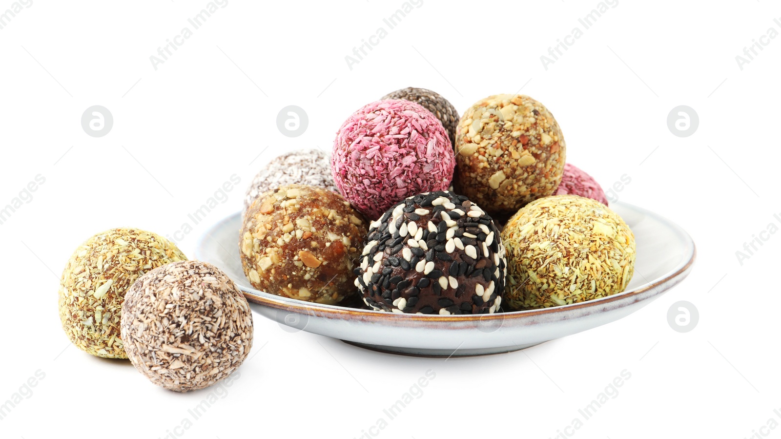 Photo of Different delicious vegan candy balls on white background