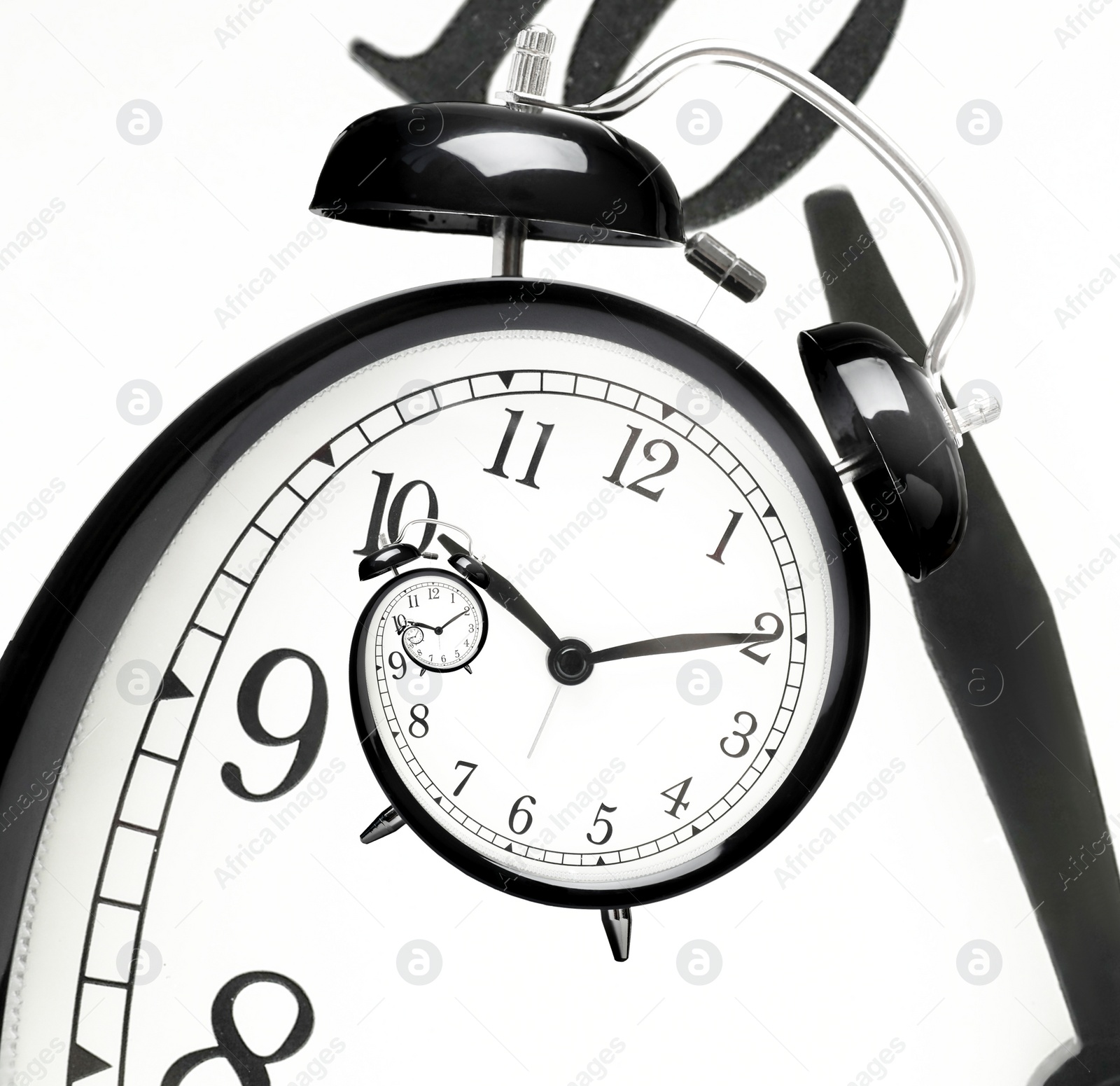 Image of Infinity and other time related concepts. Alarm clock face twisted in spiral, fractal pattern