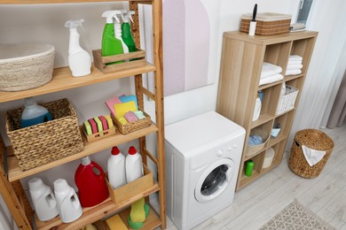 Laundry room interior with washing machine and furniture, above view