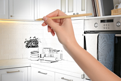 Image of Woman drawing kitchen interior design. Combination of photo and sketch