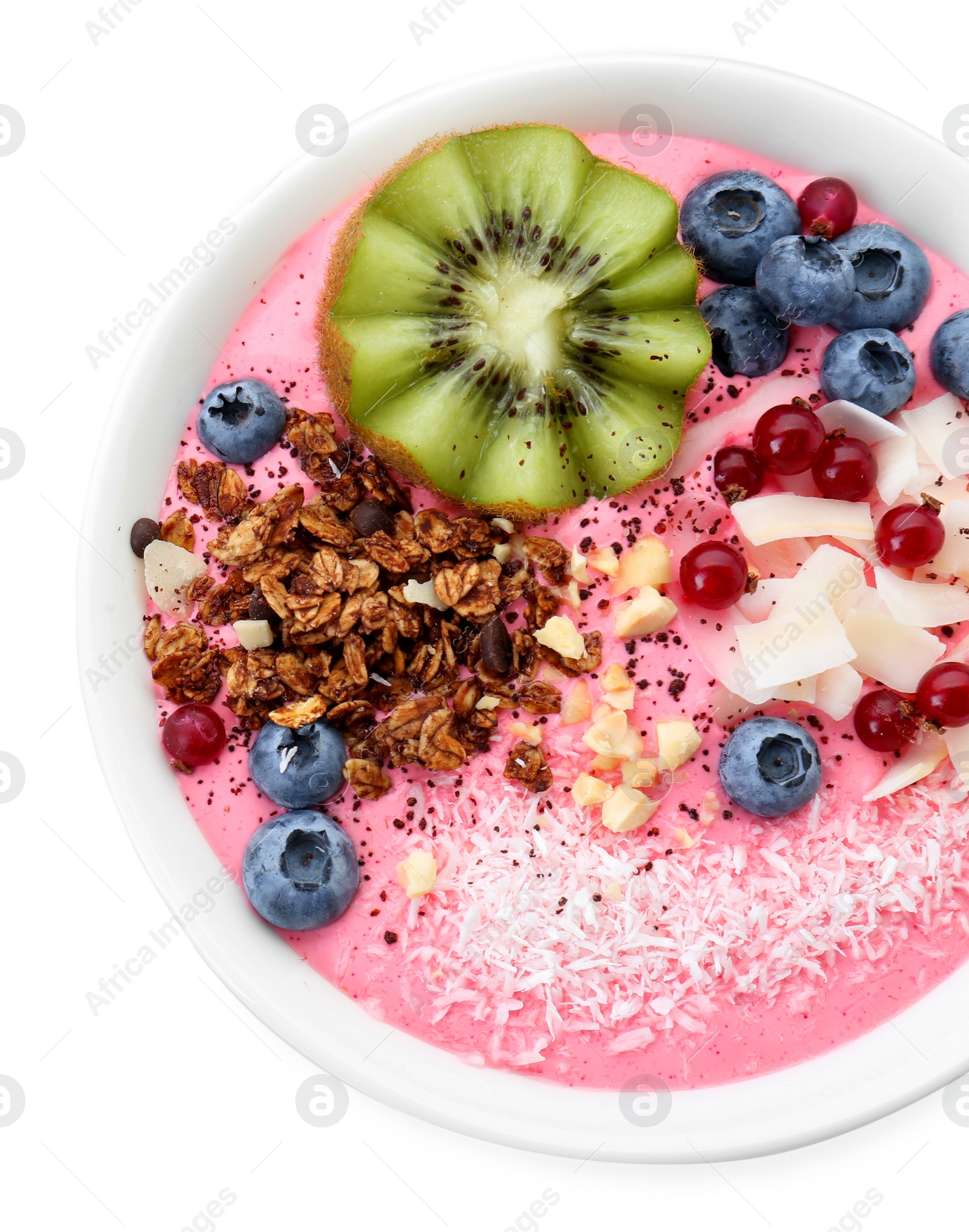 Photo of Tasty smoothie bowl with fresh kiwi fruit, berries and granola isolated on white, top view