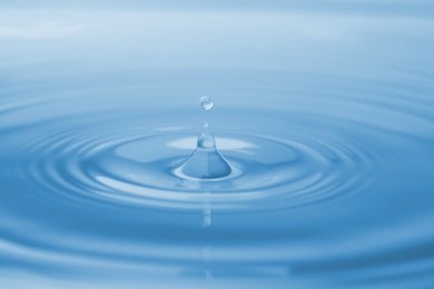 Photo of Splash of water with drops as background, closeup