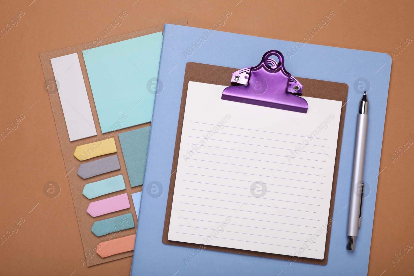 Photo of To do notes, stationery and planner on brown background, flat lay. Space for text