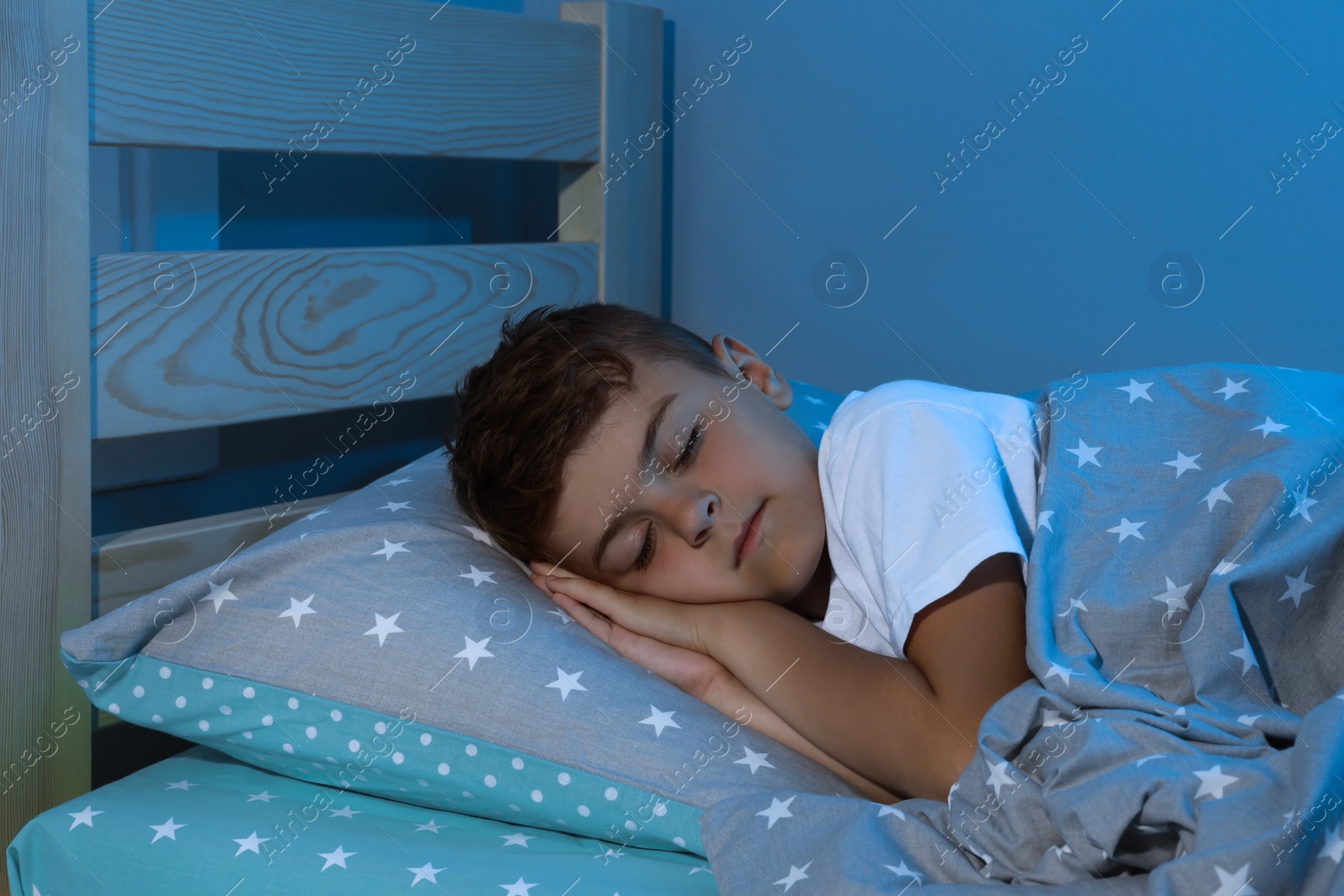 Photo of Cute little boy sleeping at home. Bedtime