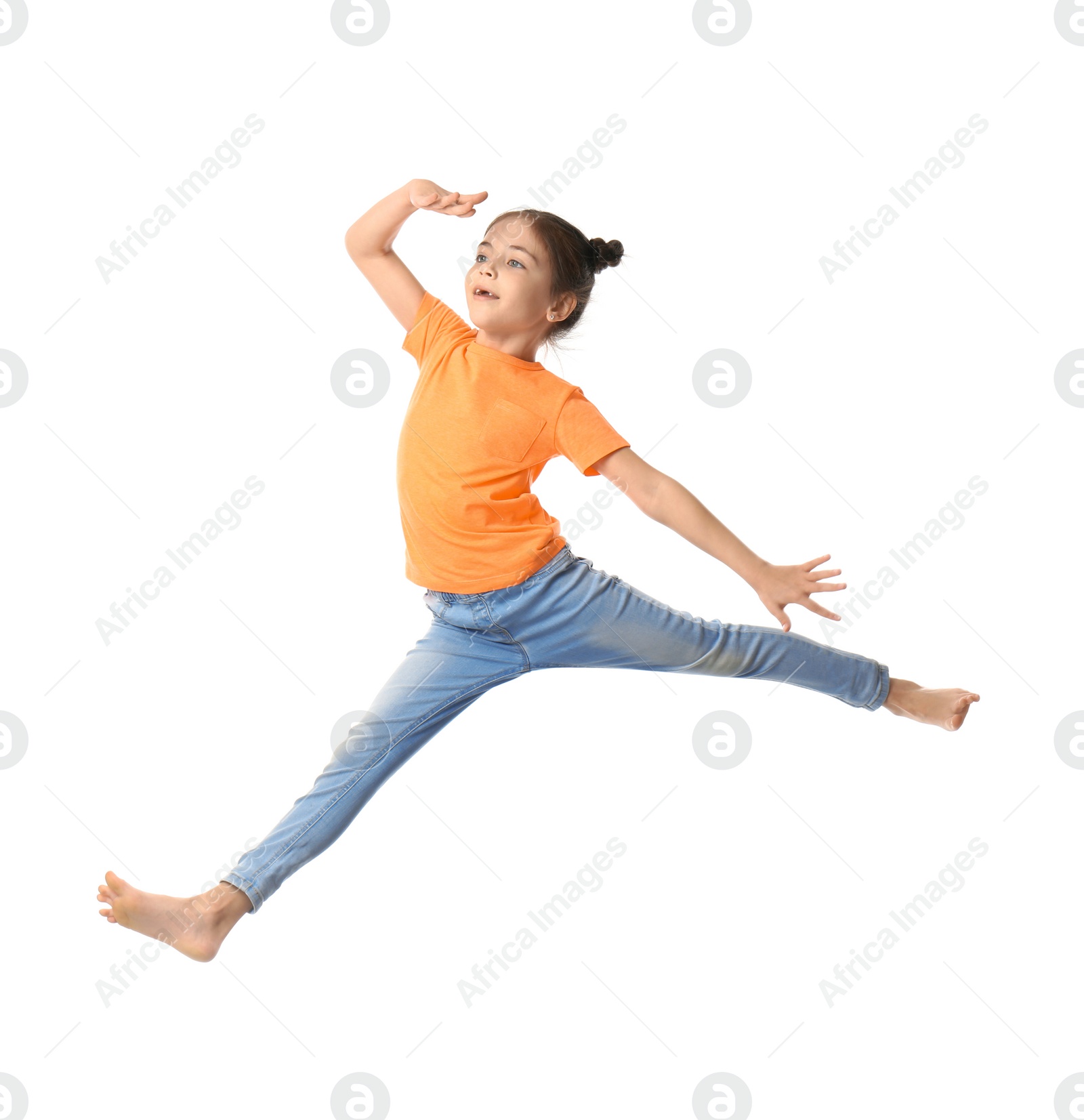 Photo of Cute little girl jumping on white background