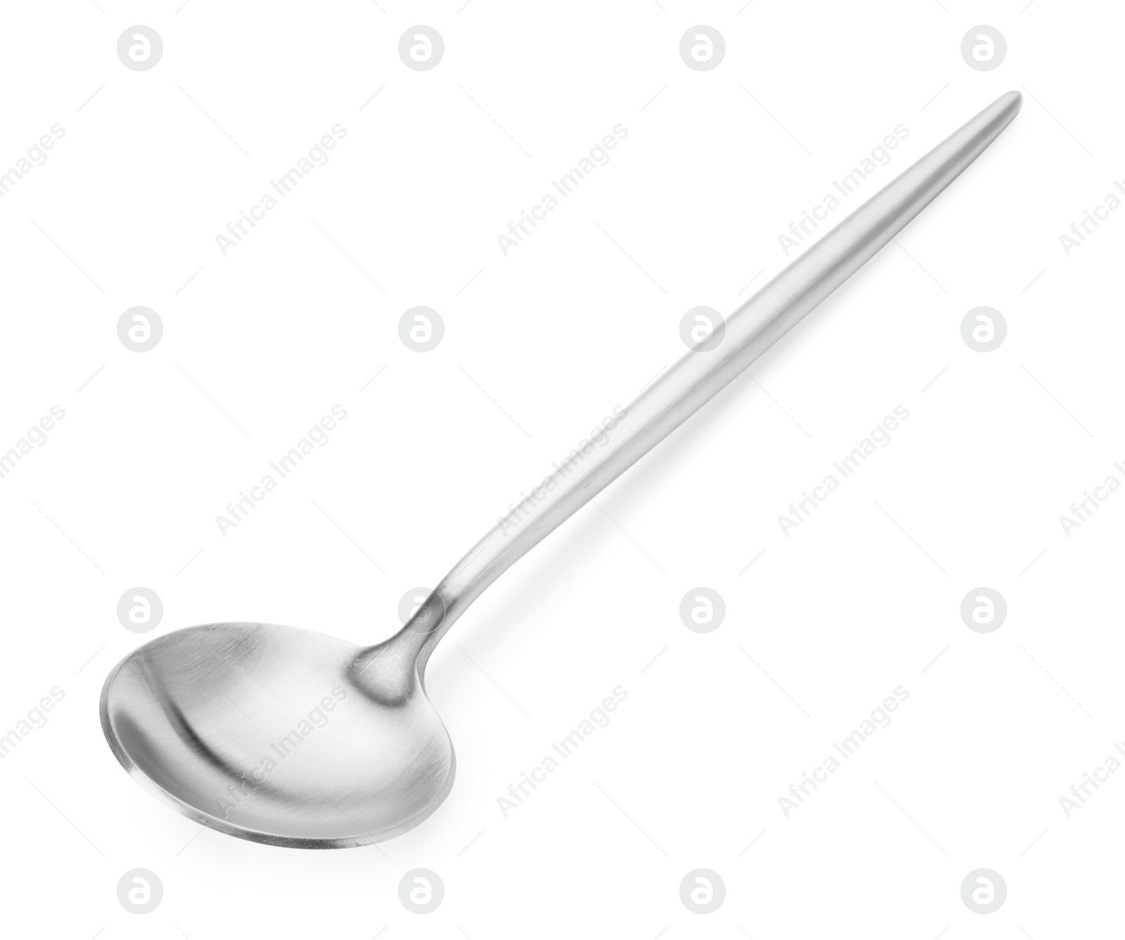 Photo of One shiny silver spoon isolated on white
