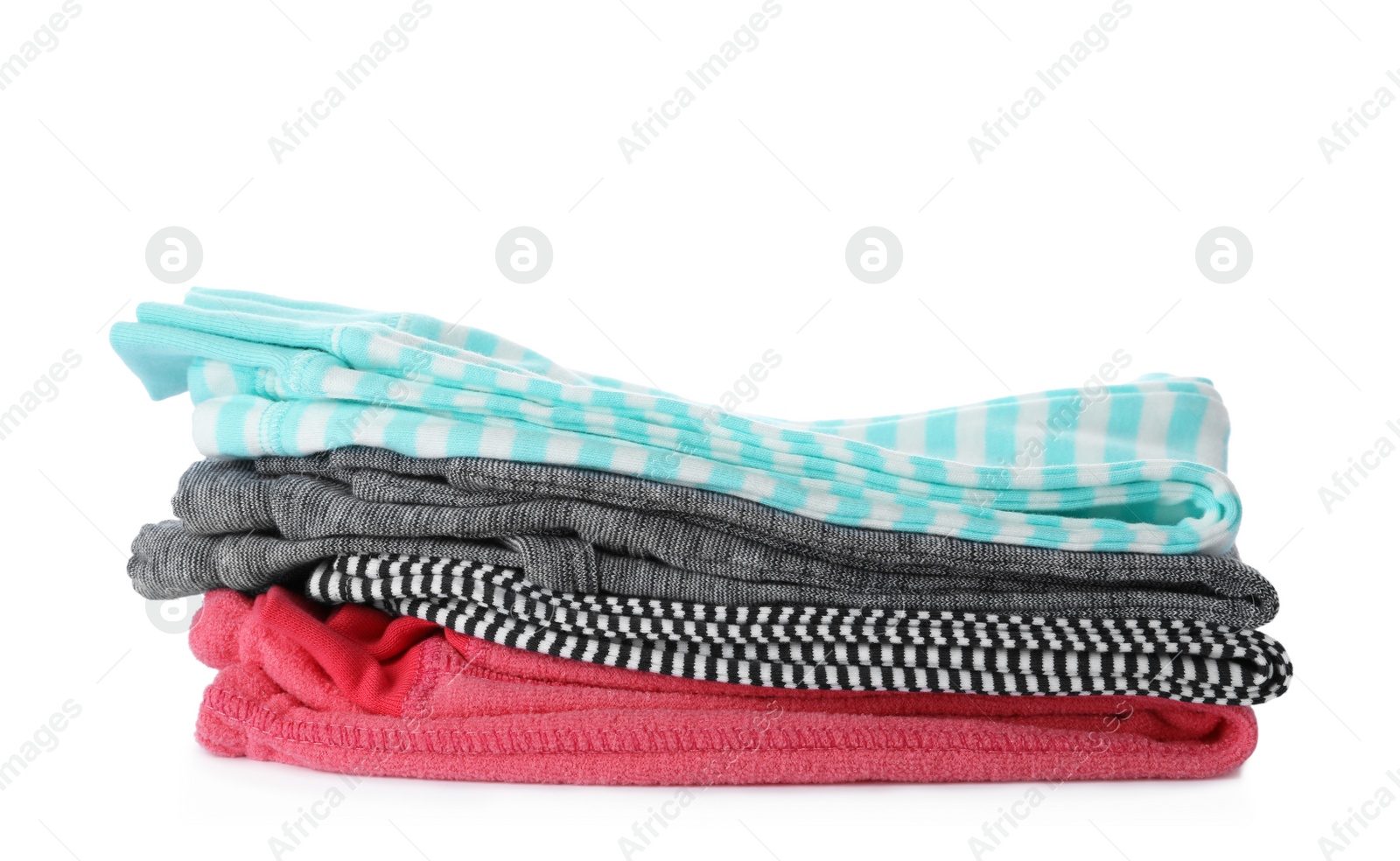 Photo of Stack of folded child clothes isolated on white