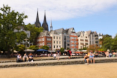 Photo of Blurred view of beautiful city street and buildings