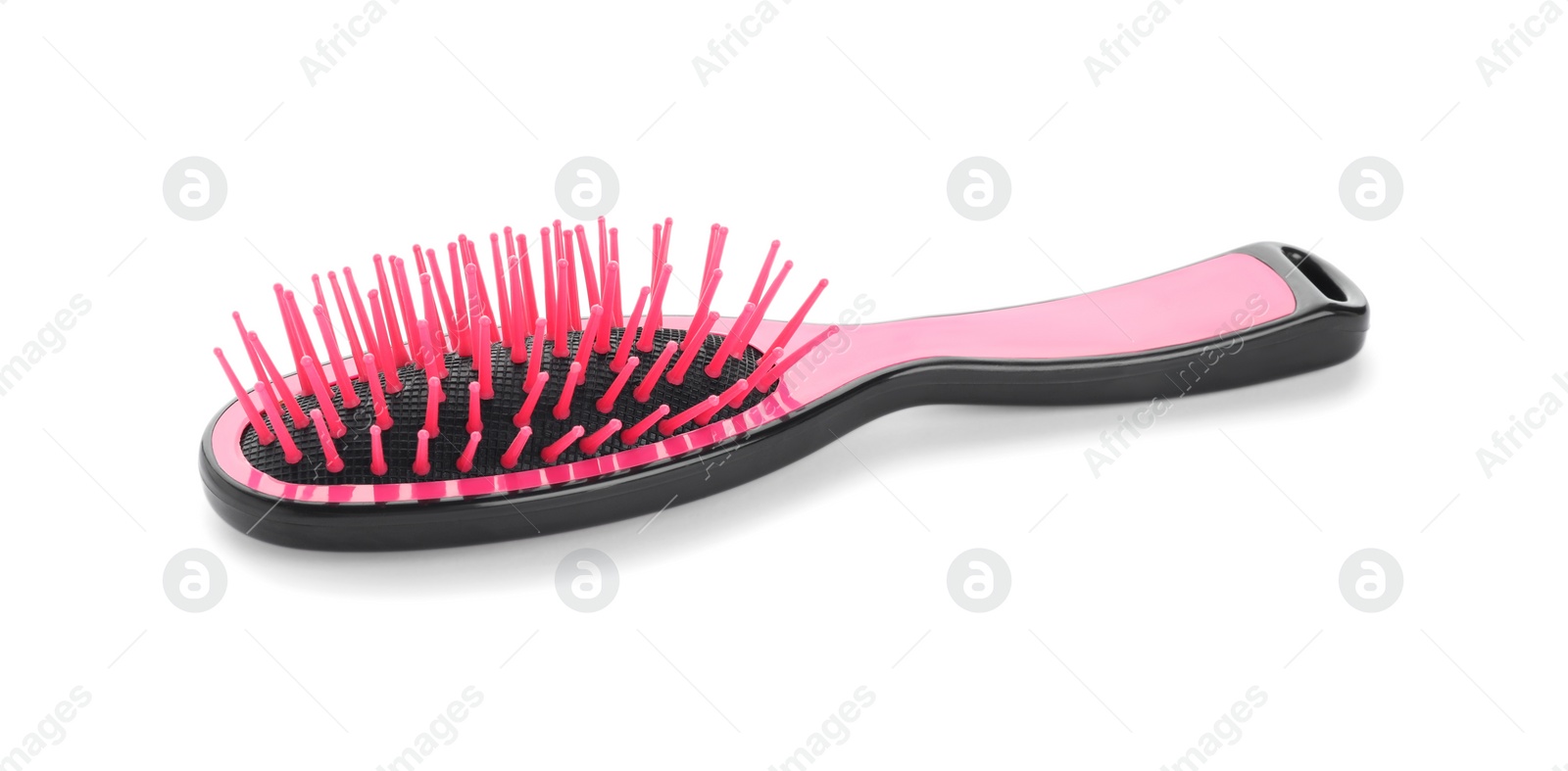 Photo of New modern hair brush isolated on white