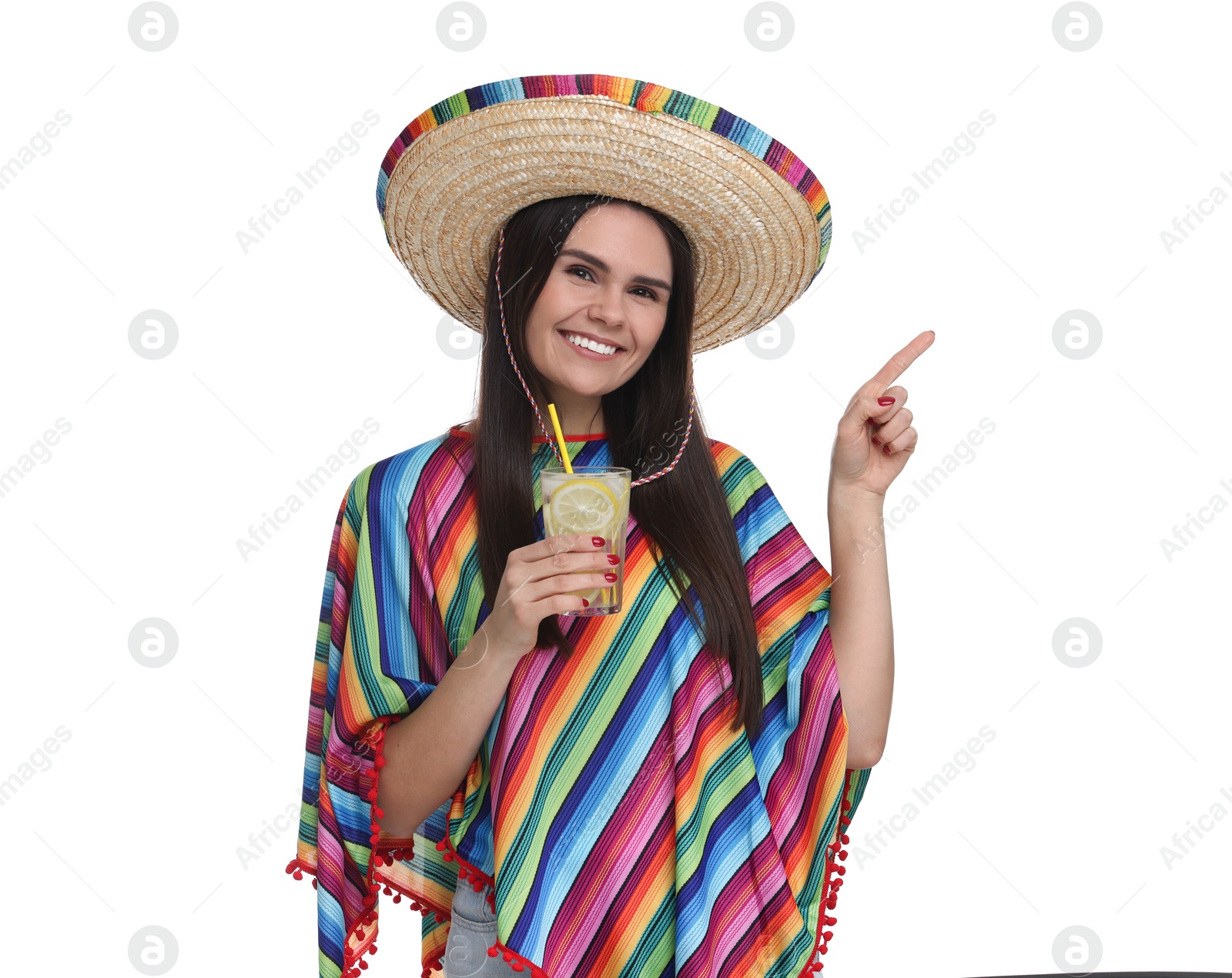 Photo of Young woman in Mexican sombrero hat and poncho with cocktail on white background