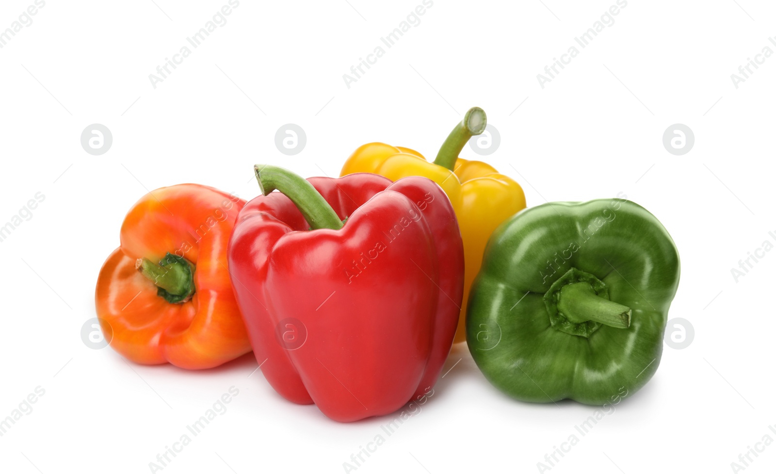 Photo of Raw ripe paprika peppers on white background