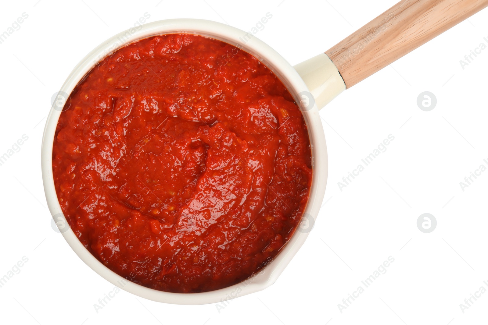 Photo of Delicious tomato sauce in pan isolated on white, top view