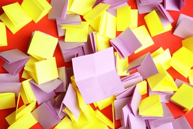 Photo of Pile of paper pieces for lottery on color background