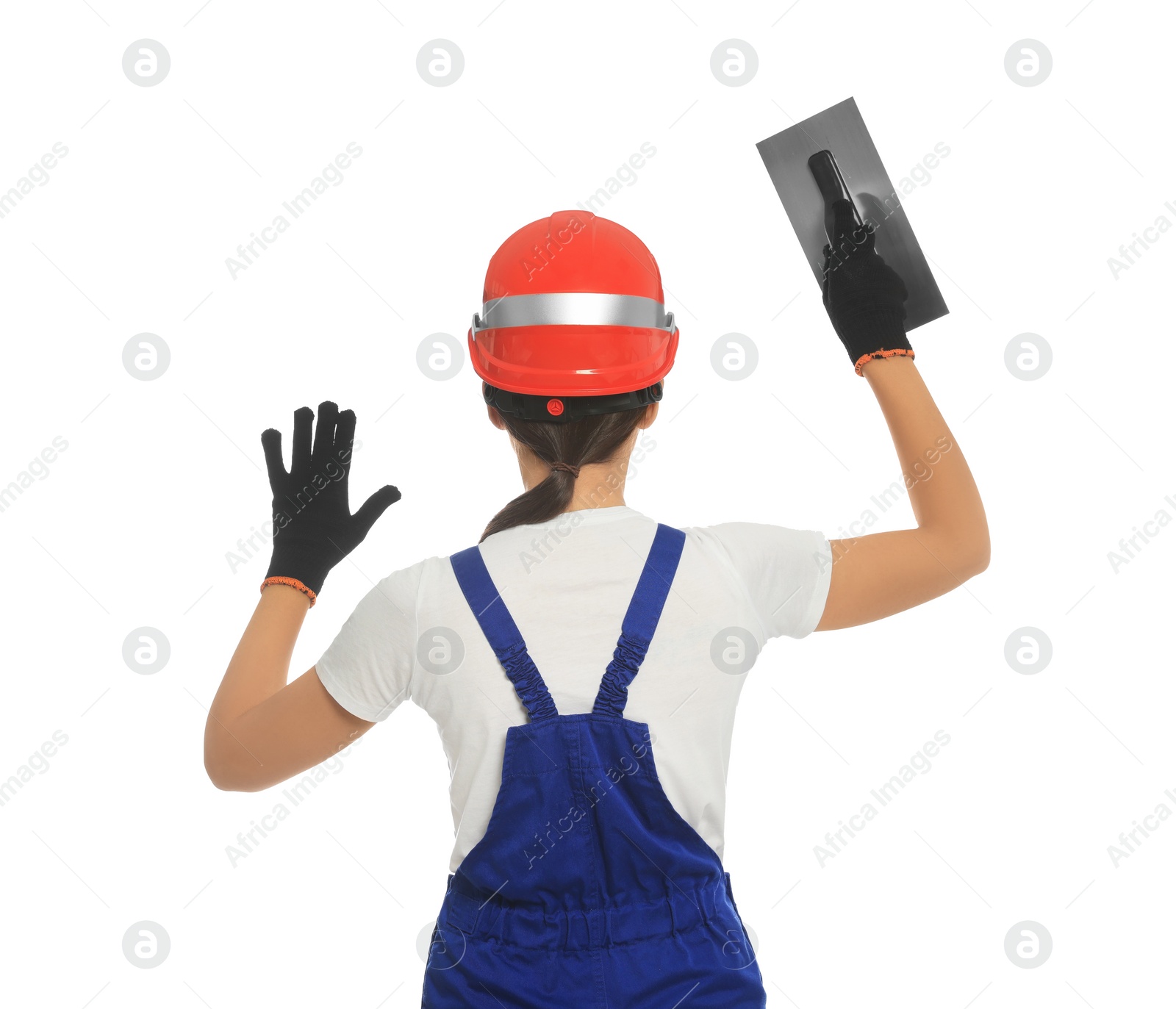 Photo of Professional worker with putty knife on white background, back view