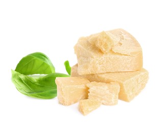 Delicious parmesan cheese and basil on white background