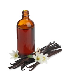 Photo of Bottle of essential oil, vanilla pods, green leaf and flowers isolated on white