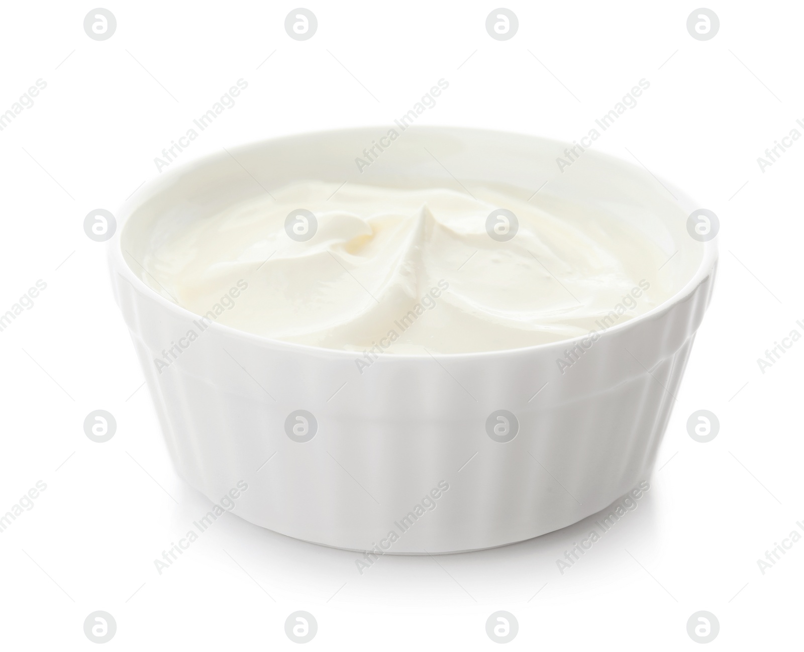 Photo of Bowl with sour cream on white background