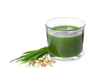 Wheat grass drink in glass, seeds and fresh green sprouts isolated on white