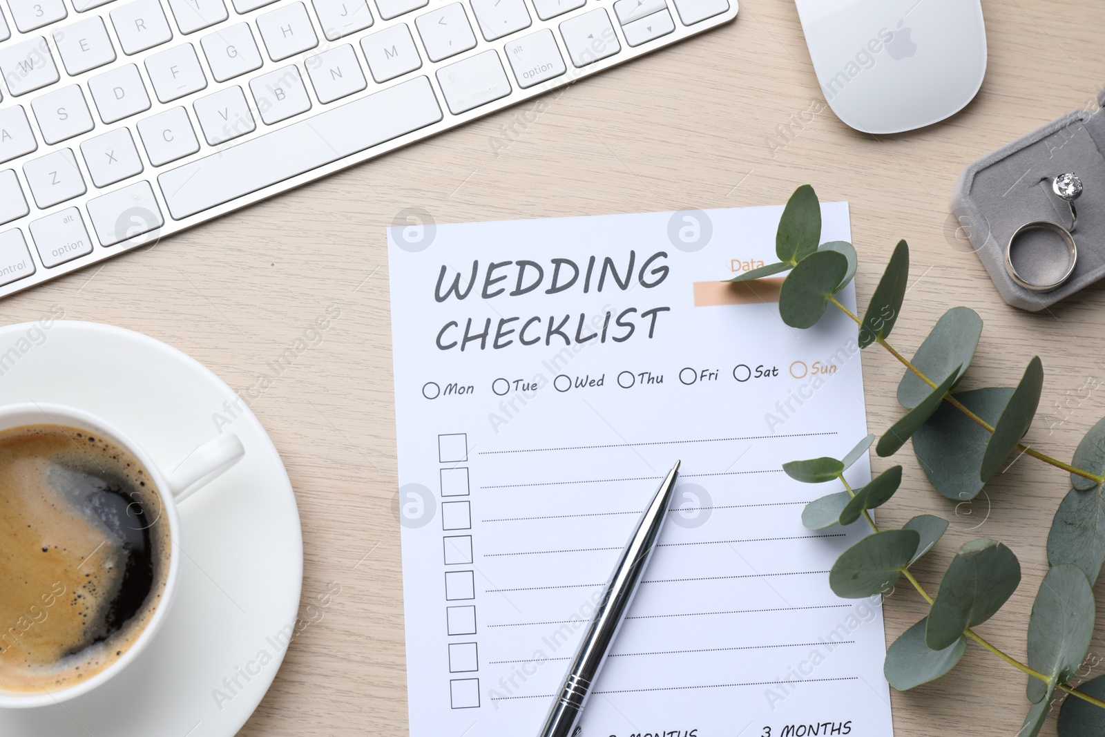 Photo of Flat lay composition with Wedding Checklist on white wooden table