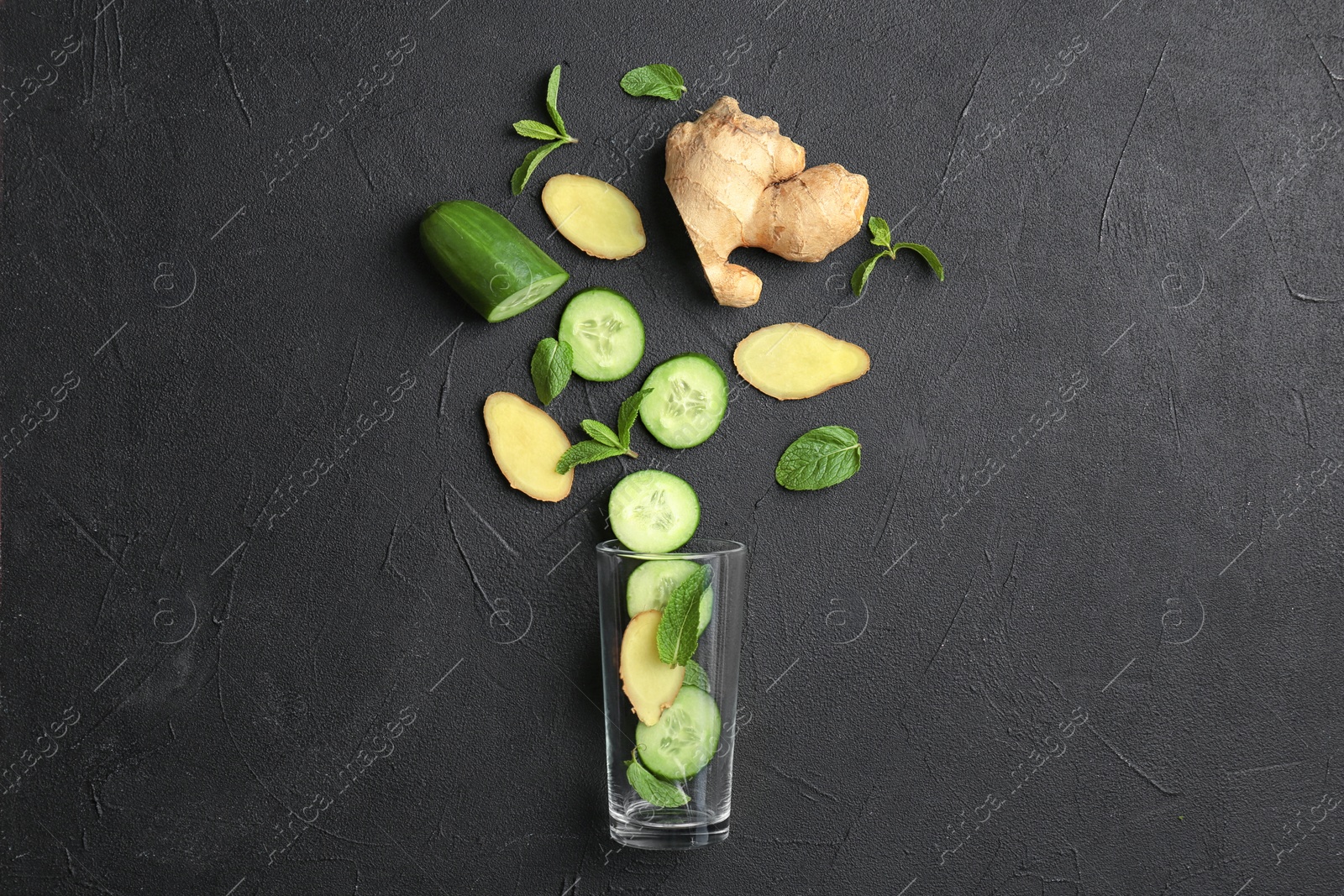 Photo of Flat lay composition with ingredients for detox summer drink on grey background